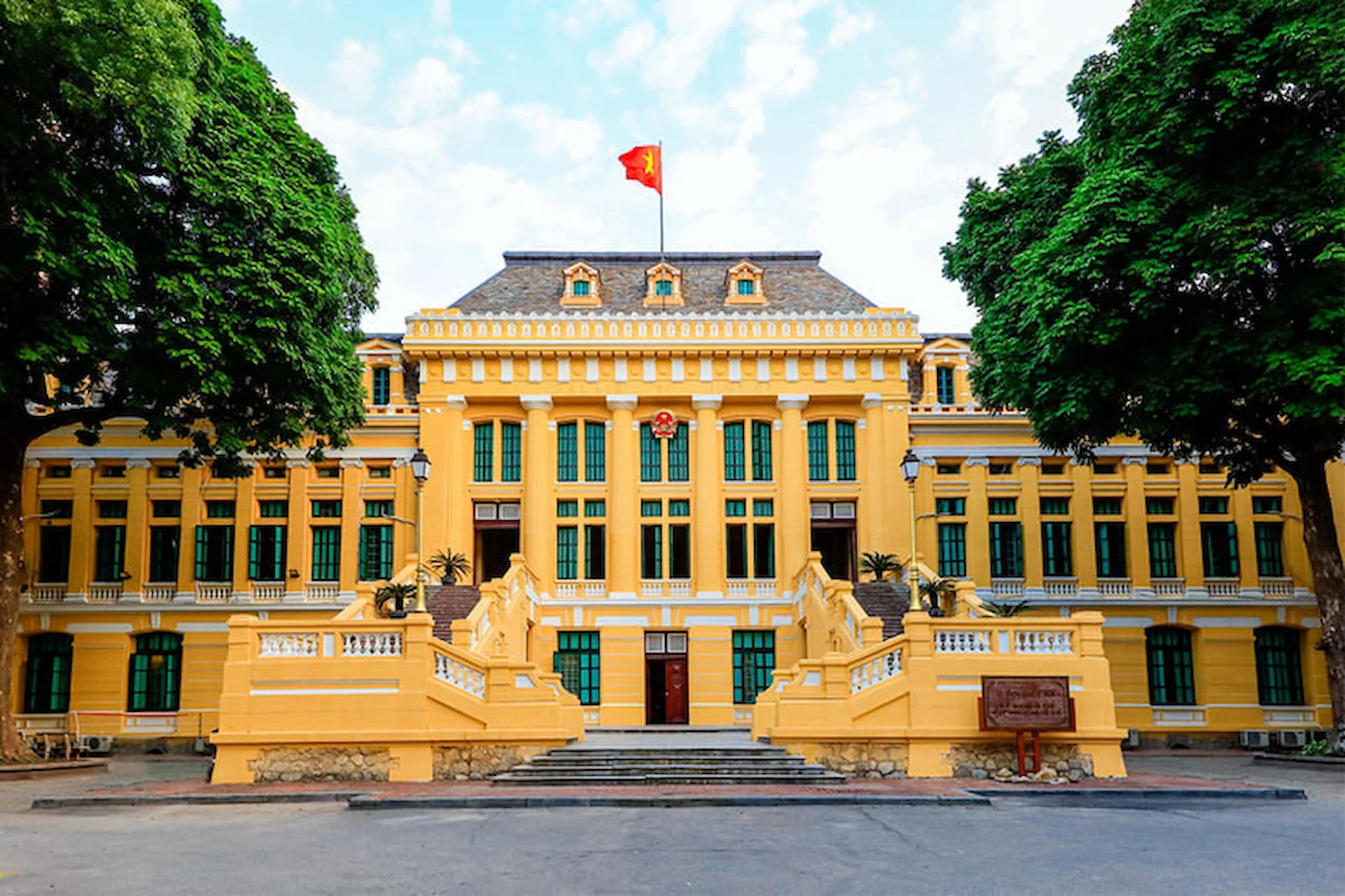 Majestic French colonial government building in Hanoi, Vietnam, under morning light, symbolizing its status as the capital.