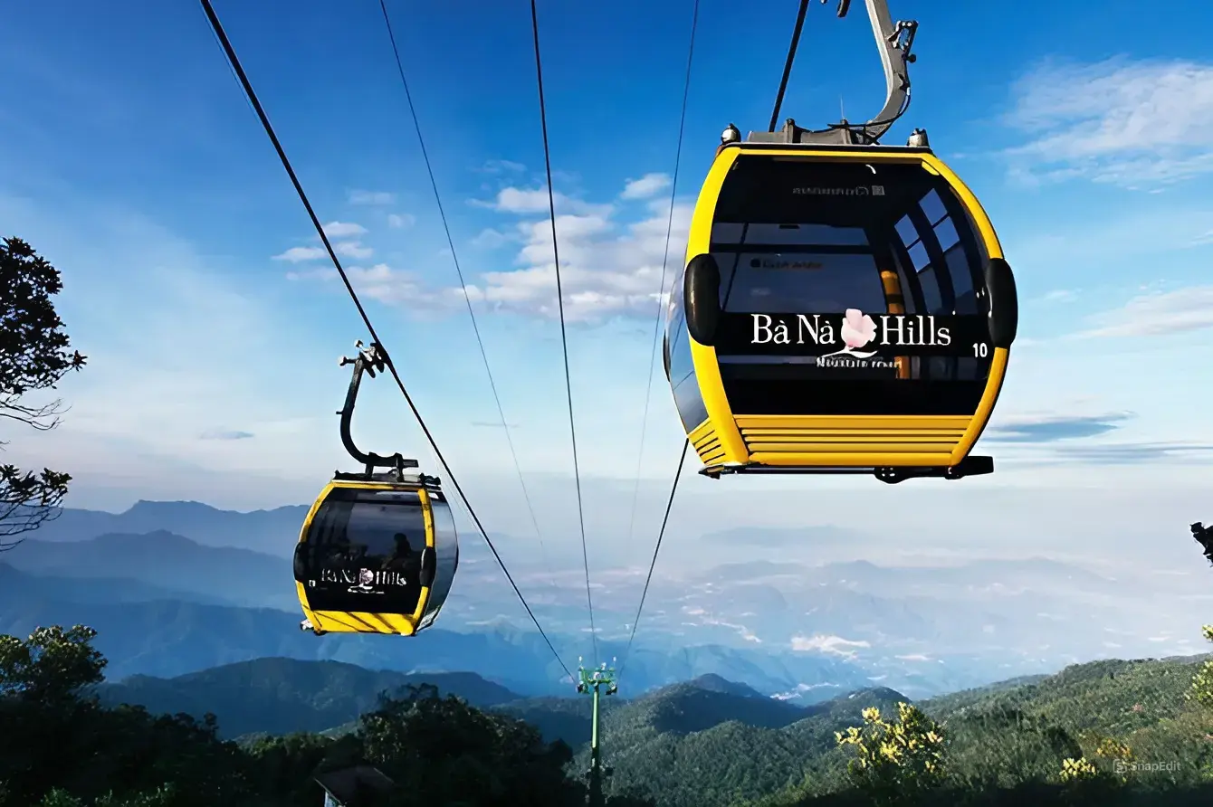  View of mountains and forest from inside the ascending cable car at Ba Na Hills Vietnam.