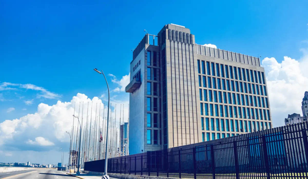 Visual comparison of a larger embassy building exterior