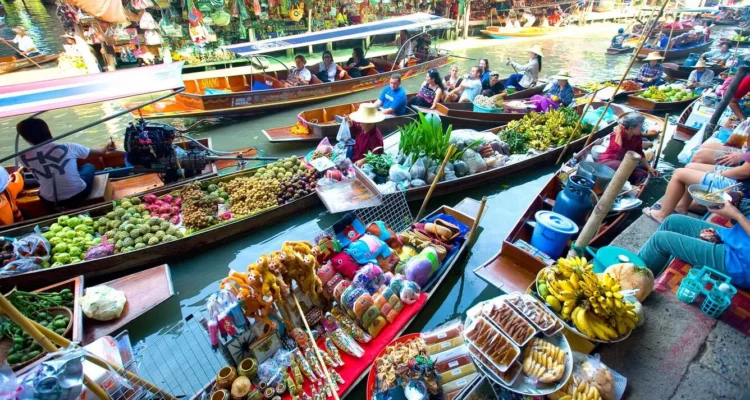 CaiRang floating market in Can Tho, a top sight in southern vietnam, bustling with boats and vendors.