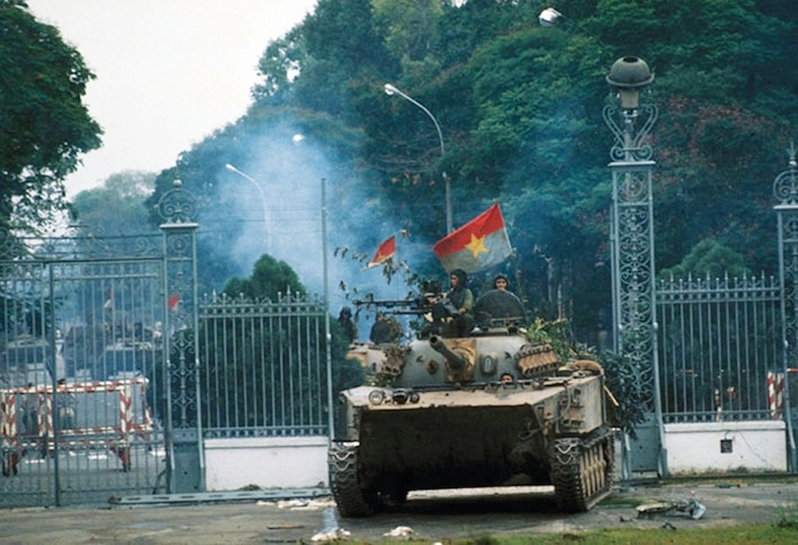 Tank 843 crashing gates of Independence Palace Saigon Vietnam signifying the end of the Vietnam War.